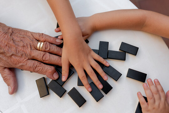 Playing domino with great grandfather