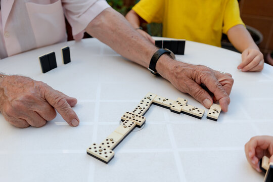 Playing domino with great grandfather