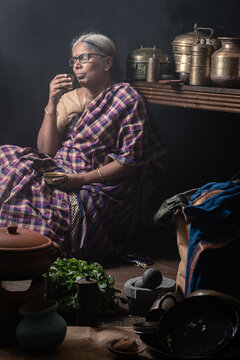 A homemaker enjoying a cup of filter coffee 