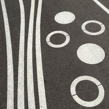 tarmac road with lines and circles