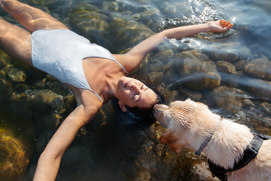 Woman floating in the river waters