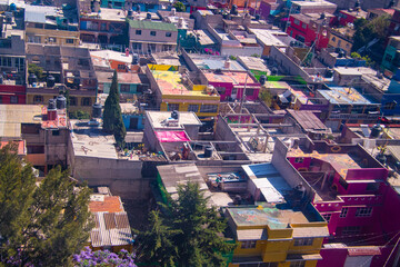 View of the Iztapalapa neighborhood in Mexico City from the Cablebús, an aerial tram, the gondola...