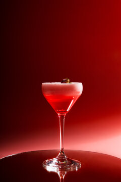 Cocktail drink on pink background