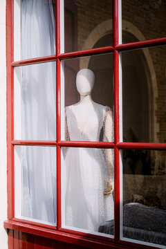 Dressed mannequin in a window