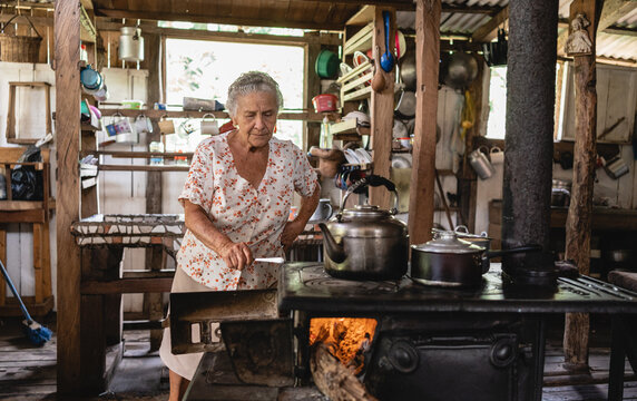 Elderly Woman Cooking.