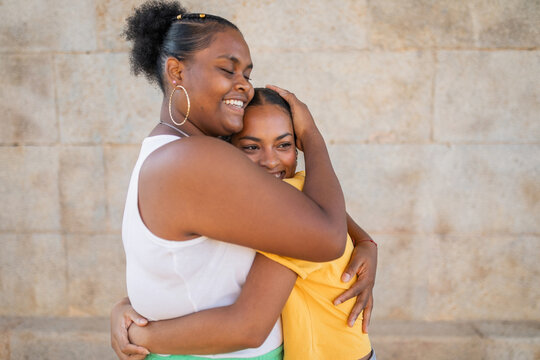 Black Women Friends Hugging