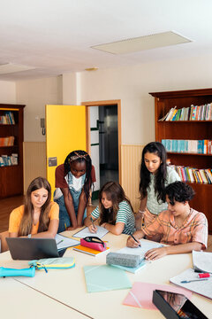 Teenagers studying