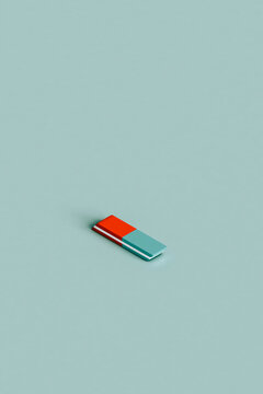 A red and blue eraser