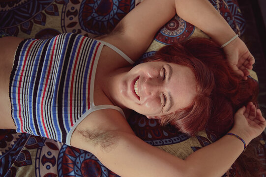Red-Haired Woman Smiling