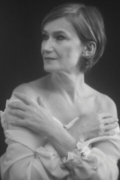 Portrait of stylish middle aged woman with retro style