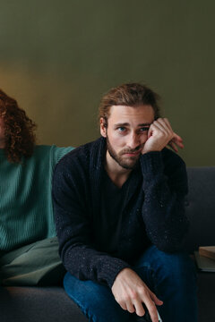 Loser male in videogame at home.