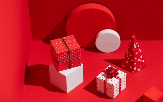 Christmas presents. Red and white themed gift holiday background.
