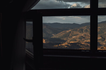 Opened window with beautiful mountains view