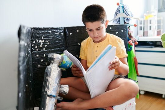 Boy Making A Project On A Space For School