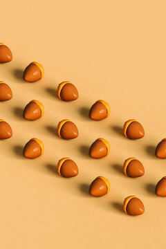 rows of acorns on yellow background