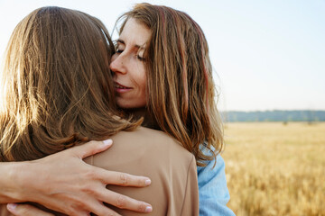 lesbian couple in wheat field