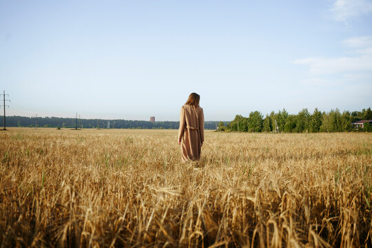Woman in wheat field