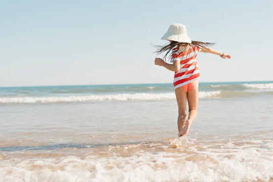 Girl by the shore  summer mode