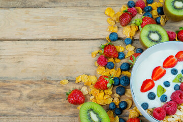 Cereal and berries on the bowl with copy space