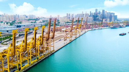 Cranes loading and unloading in the Singapore port