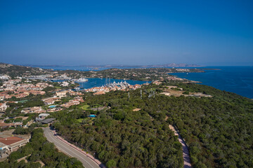 Naklejka na ściany i meble One of the most expensive resorts in the world. Aerial View of Porto Cervo, Italian seaside resort in northern Sardinia, Italy. Drone view Centre of Costa Smeralda.