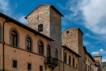 Fototapeta na wymiar A glimpse of the historic center of Sansepolcro, Arezzo, Italy, in Via Matteotti