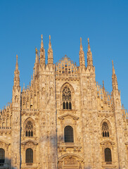 Fototapeta premium Architectural details with the exterior of the Milan Duomo