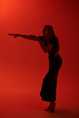 dance in red lighting