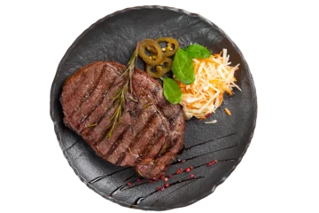  Cooked ribeye steak in a plate. View from above. Transparent. © Игорь Соколов