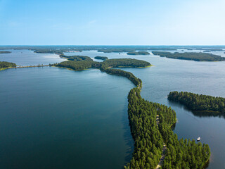 Fototapeta na wymiar Esker road in Punkaharju in the middle of lake Saimaa, Finland