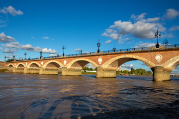 Fototapeta na wymiar stone bridge in france pont de pierre in Bordeaux city Aquitaine french southwest