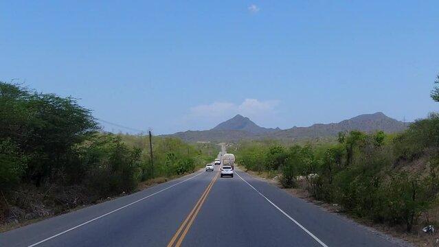 one of the main roads in the south of the dominican republic, entering a city called azua