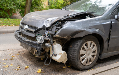 Crashed cars front side in the accident on the city street.