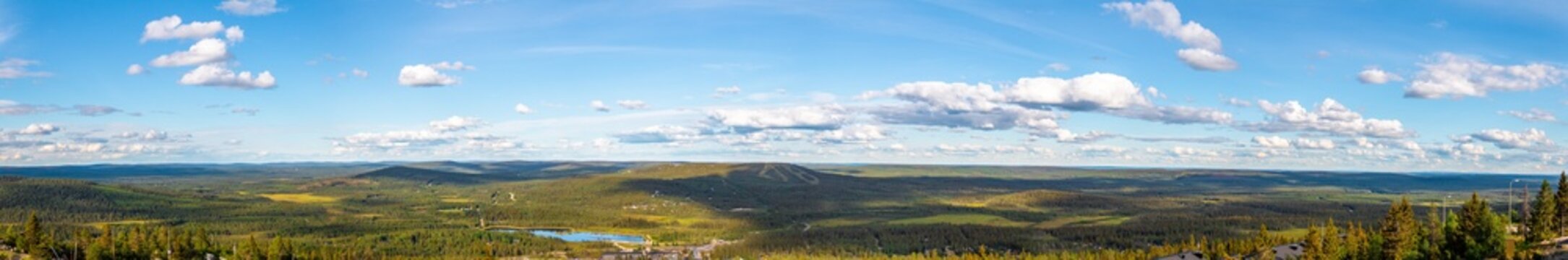 Landscape view from the top of Iso-Syöte hilltop with clouds and sky, Lapland, Finland © Henrik Lobbas