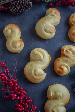Sweet Swedish buns baked with saffron cranberries and raisins