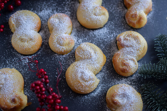 Sweet Swedish buns baked with saffron cranberries and raisins