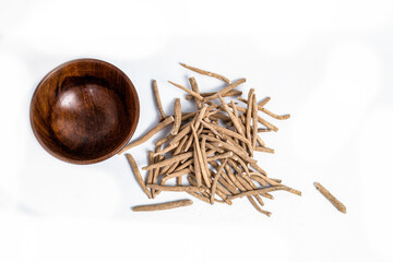 Aswagandha root or Withania somniferaand  isolated on white background Alternative medicine