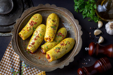 Stuffed zucchini with meat from traditional Turkish cuisine. Turkish name; etli kabak dolmasi