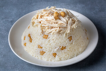 Traditional delicious Turkish food; Rice with chickpeas and chicken (Turkish name; Tavuklu nohutlu pilav or pilaf)