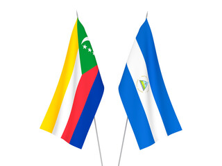 National fabric flags of Nicaragua and Union of the Comoros isolated on white background. 3d rendering illustration.