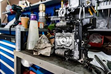 Large workbench with tools at station for vehicle technical servicing