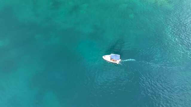 Fishermen fish far out to sea aerial view 4 K