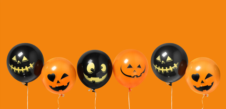 Funny Balloons for Halloween party on orange background