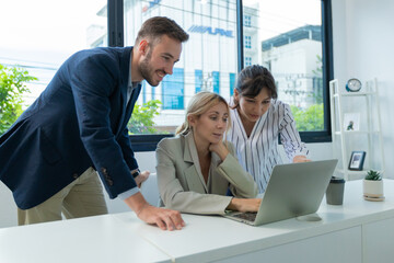 Young professionals having a discussion at a meeting in a modern office on a small conference in the meeting