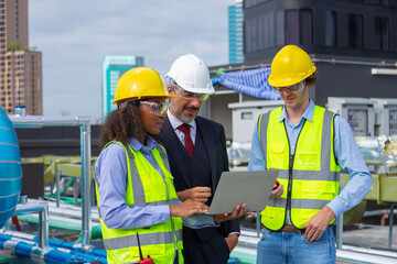 Engineer under industrial inspection Large water heaters are used in high-rise condominiums.
