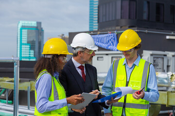 Engineer under industrial inspection Large water heaters are used in high-rise condominiums.

