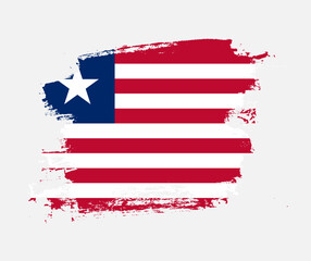 Artistic Liberia national flag design on painted brush concept