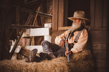 Cowboys group under conversation hand holding gun or rifle weapon ,this is vintage western...