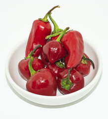 paprika in bowl on white background.