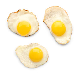 Tasty fried quail eggs on white background